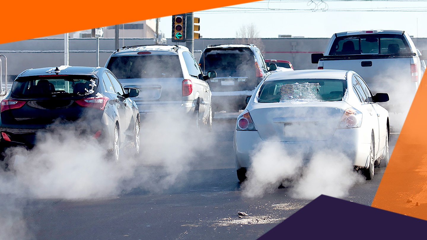 image of cars driving with steam coming out of exhausts